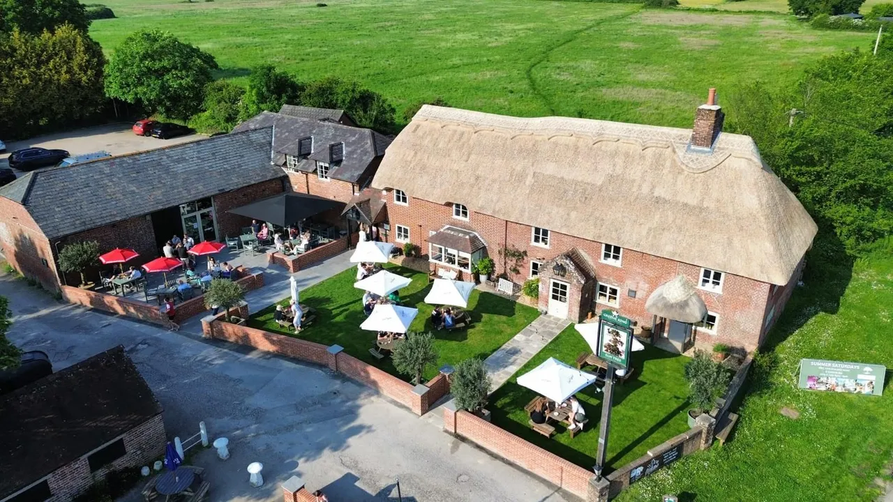 The ElmTree, Hightown Road, Hightown, Ringwood BH24 3DY, UK.  One minute from A31 - large free car park.  Event held in large Tythe Barn on site.  Main bar and Restaurant open as usual 12.-12. www.elmtreeringwood.co.uk photo 1