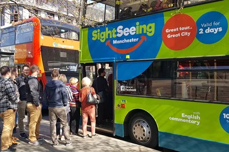 Hop-on Hop-off Family Sightseeing Bus Tour of Manchester for Two Adults and Two Children at Manchester
