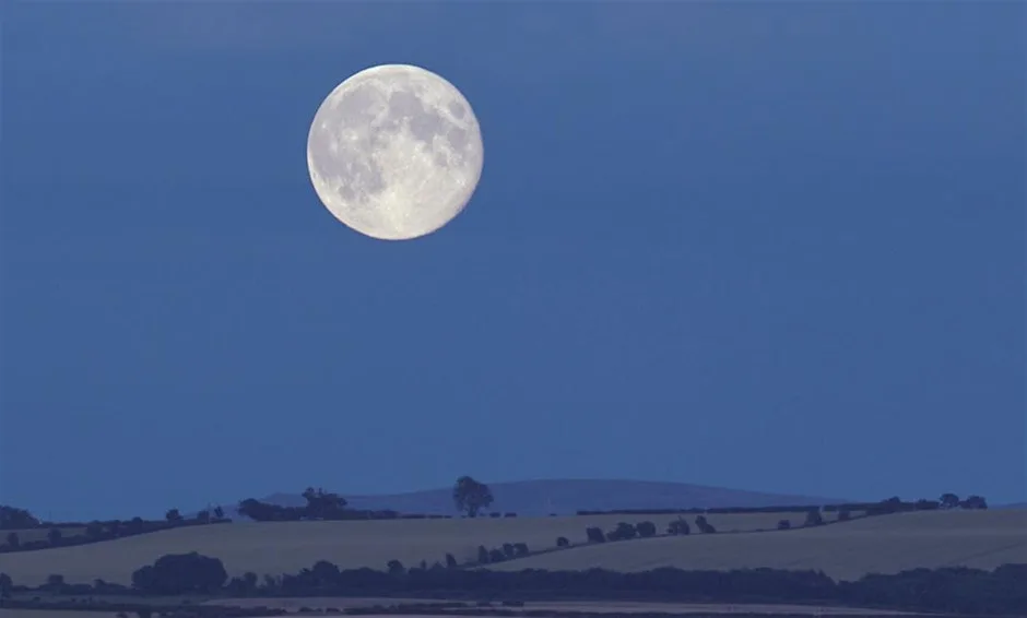 A Harvest Moon lights up the landscape at Sutton Bank National Park Centre