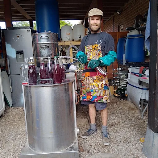 Juice on the Loose- extracting juices by steaming, scratting and pressing at Hockerton Housing Project
