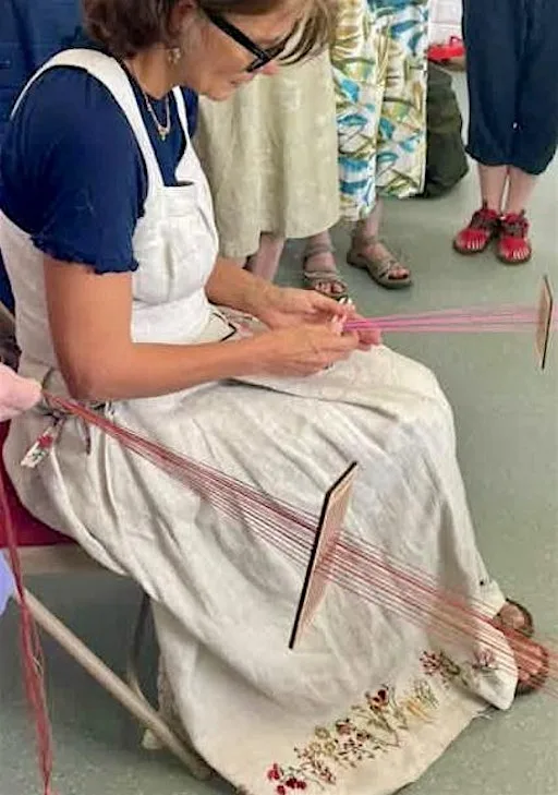 Weaving a narrow linen band with rigid heddle loom at Chapter Arts Centre