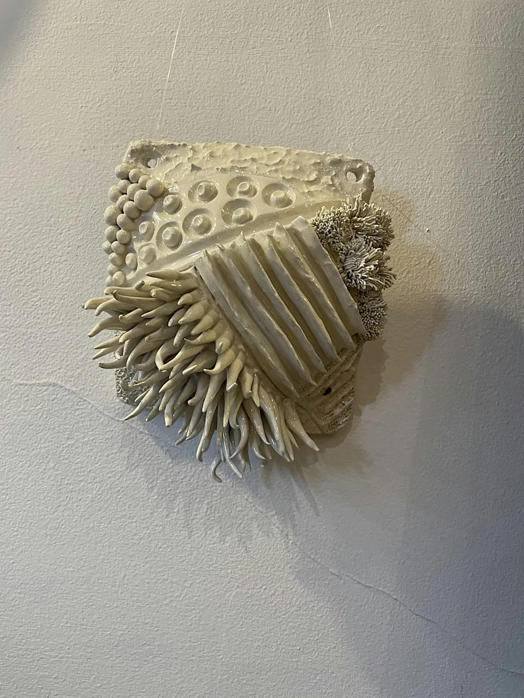 Textured ceramic wall tile at The Classroom