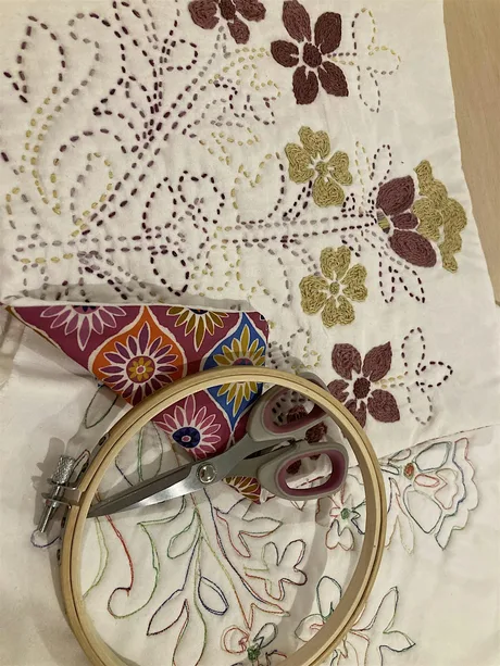 Make a quilted hand embroidered cushion cover